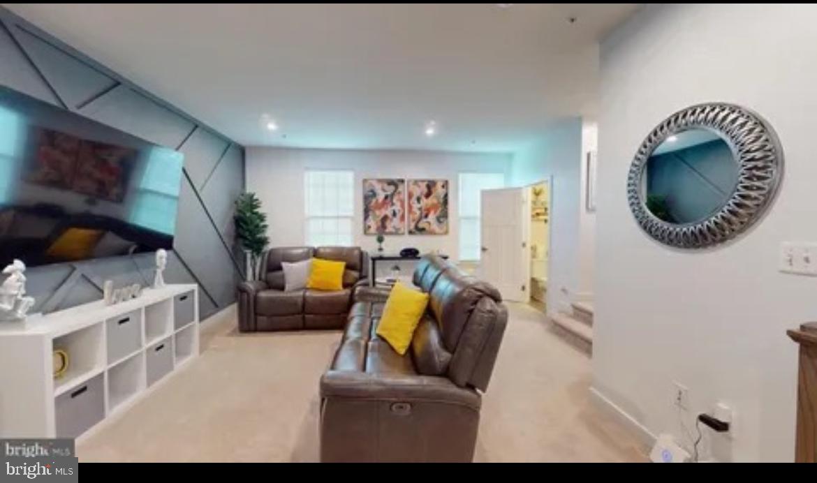 8002 General Greene Street Brandywine, MD 20613 - Photo 10 of 16 a living room with furniture and a couch