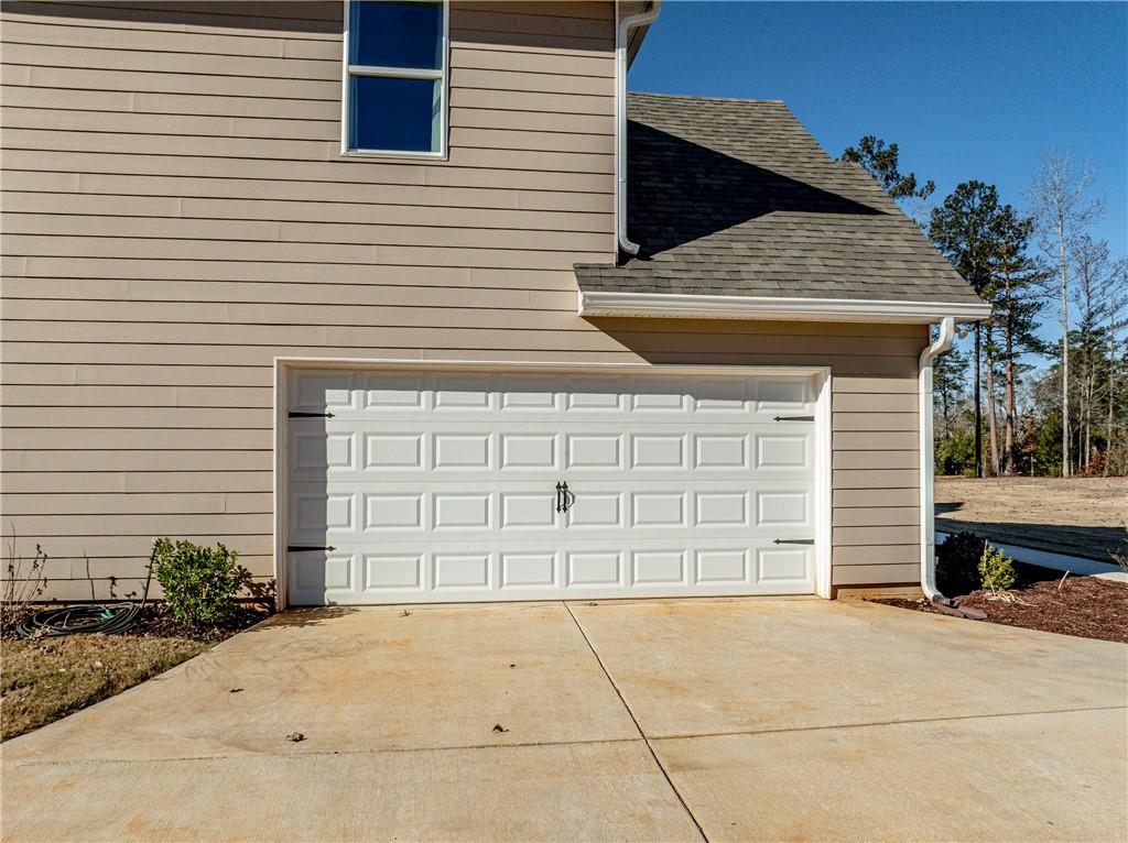 103 Hammond Road Griffin, GA 30223 - Photo 18 of 76 a front view of a house with a garage