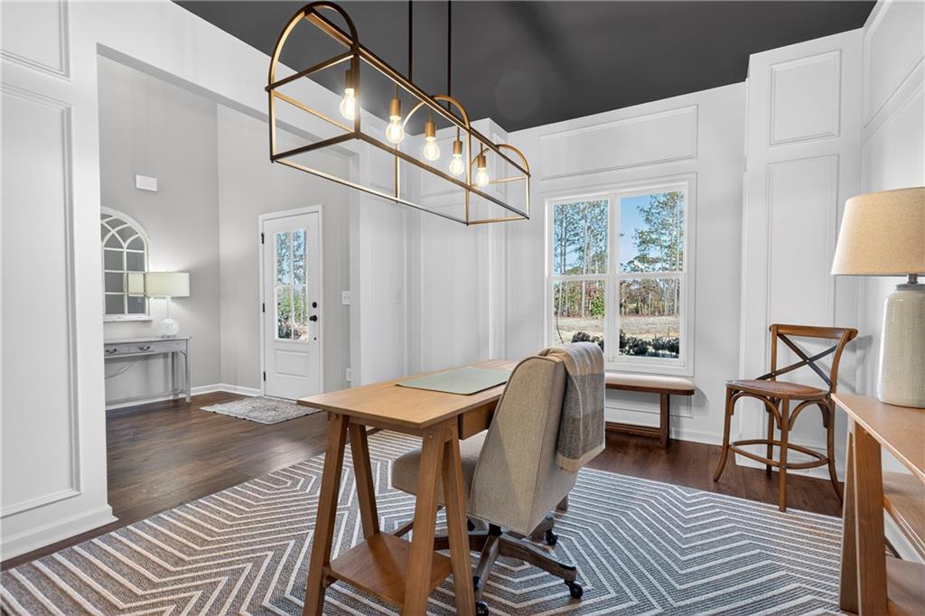 103 Hammond Road Griffin, GA 30223 - Photo 25 of 76 a view of a dining room with furniture window and wooden floor
