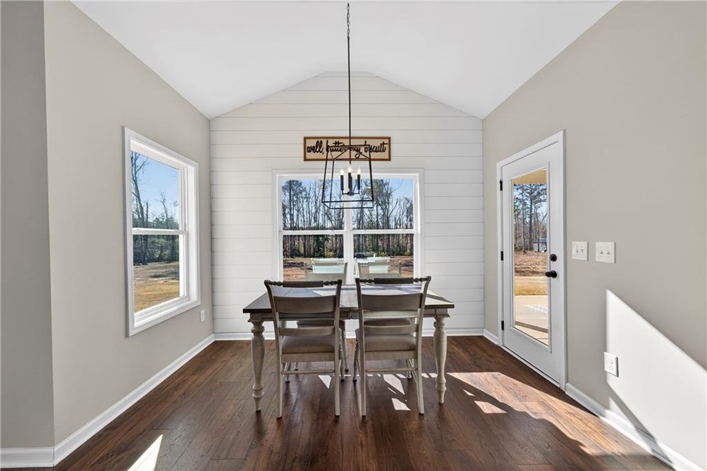 103 Hammond Road Griffin, GA 30223 - Photo 40 of 76 a view of a dining room with furniture window and wooden floor