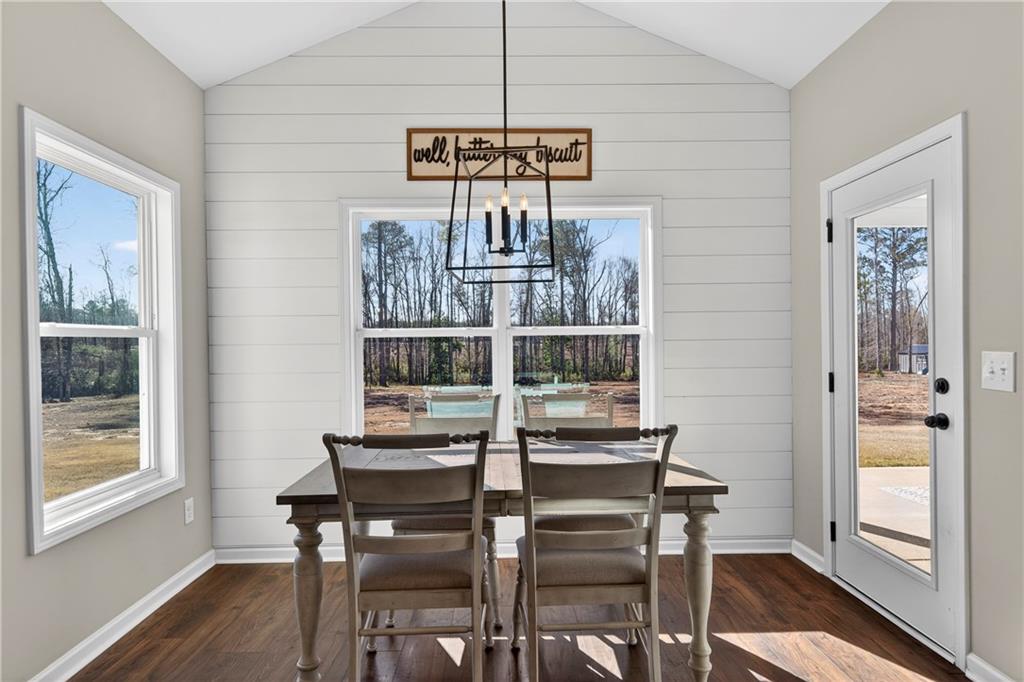 103 Hammond Road Griffin, GA 30223 - Photo 41 of 76 a view of a dining room with furniture window and wooden floor