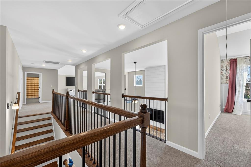 103 Hammond Road Griffin, GA 30223 - Photo 56 of 76 a view of a hallway with wooden floor and windows