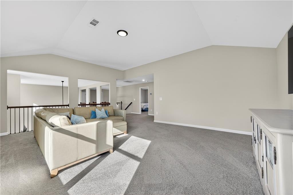 103 Hammond Road Griffin, GA 30223 - Photo 71 of 76 a living room with furniture and a table