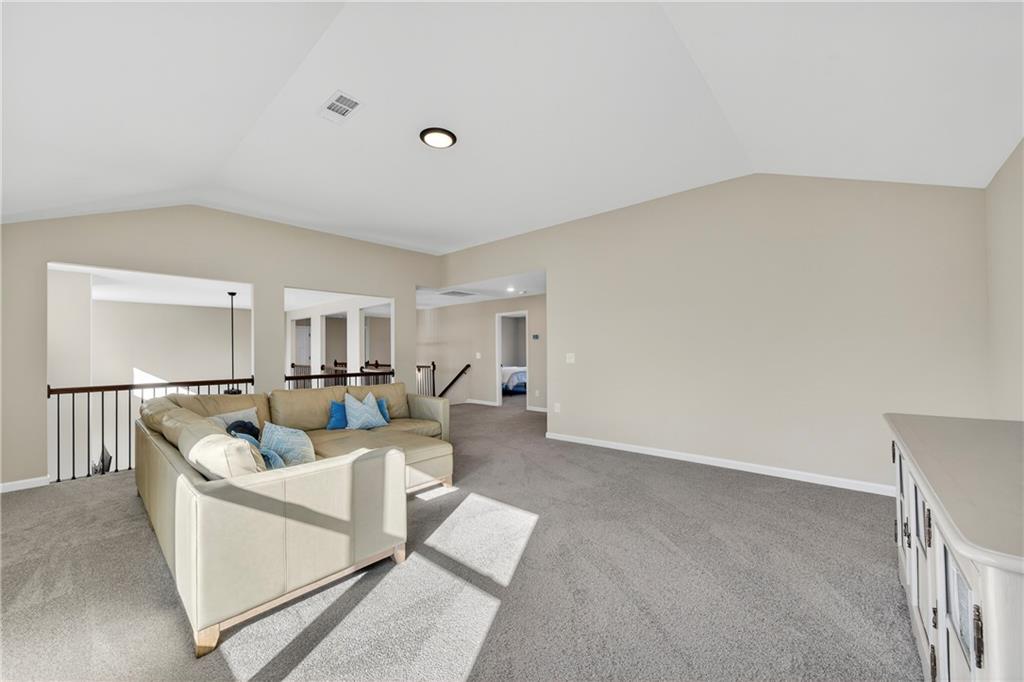 103 Hammond Road Griffin, GA 30223 - Photo 72 of 76 a living room with furniture and white walls