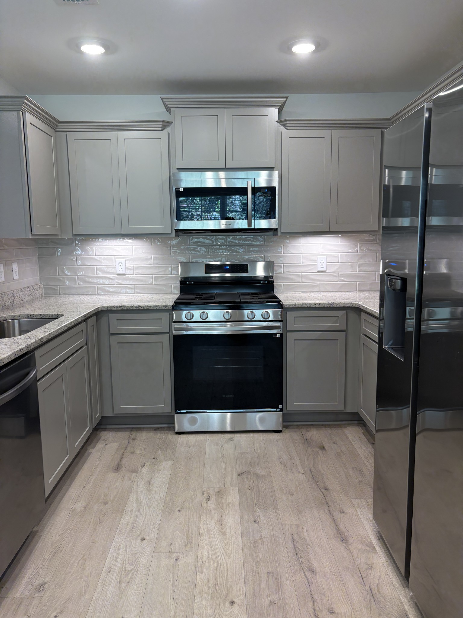 5730 Craven Lane Rockvale, TN 37153 - Photo 16 of 27 a kitchen with stainless steel appliances granite countertop a stove a sink and a microwave