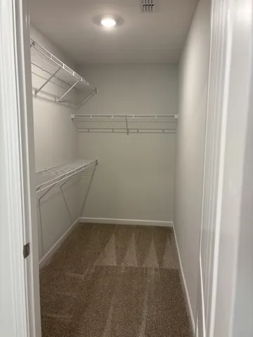 a bathroom with a bathtub and sink