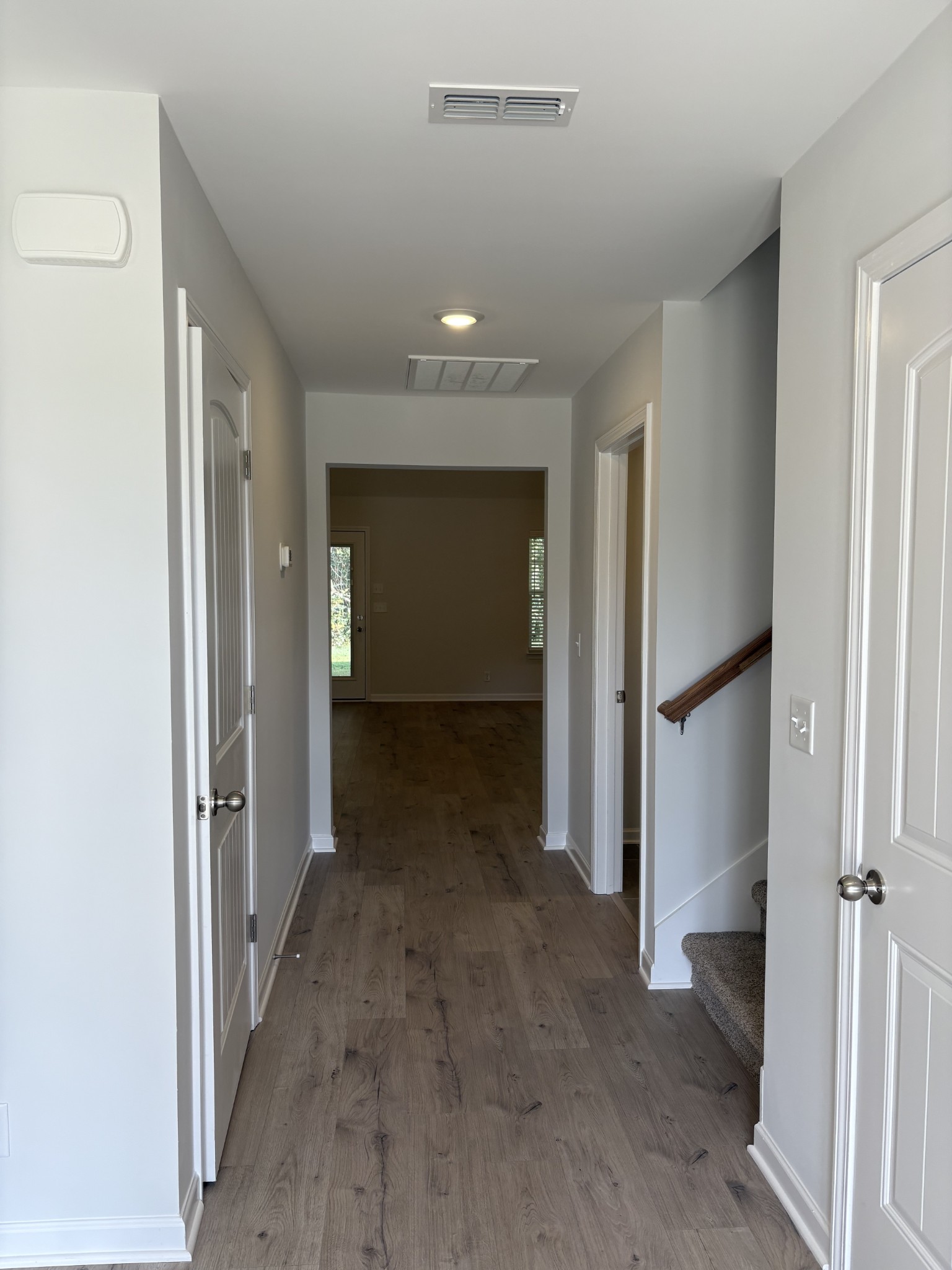 5730 Craven Lane Rockvale, TN 37153 - Photo 7 of 27 a view of a hallway with wooden shelves