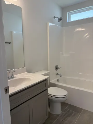 an empty room with a empty space and window