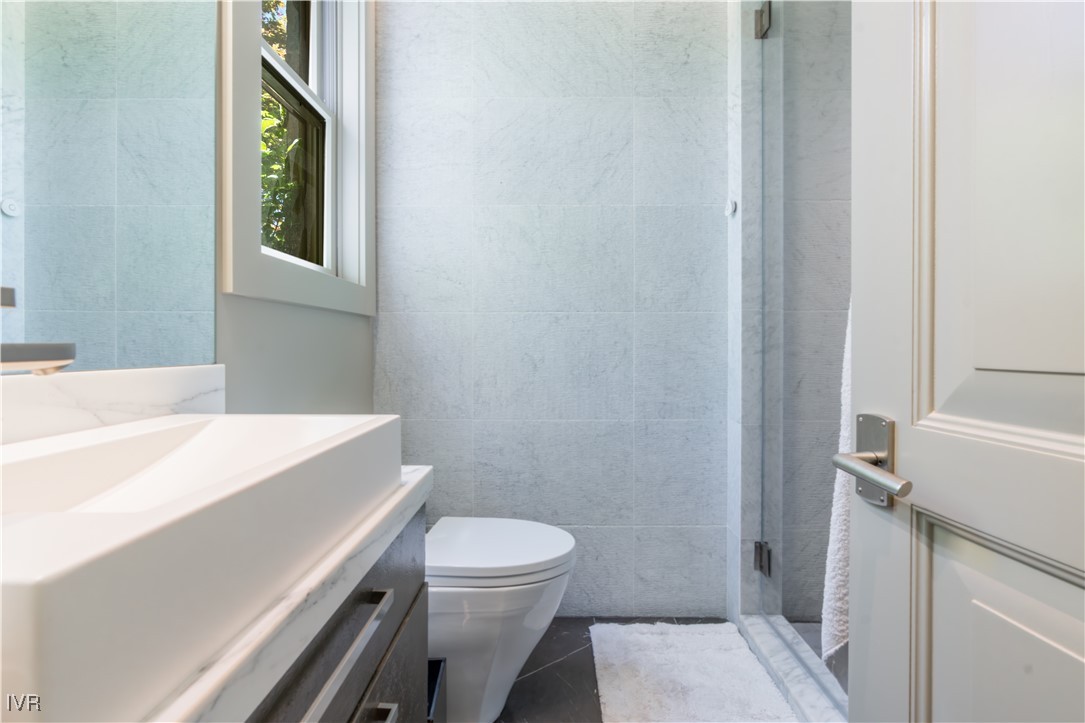 475 Tuscarora Road Crystal Bay, NV 89402 - Photo 31 of 49 a bathroom with a sink a toilet and shower