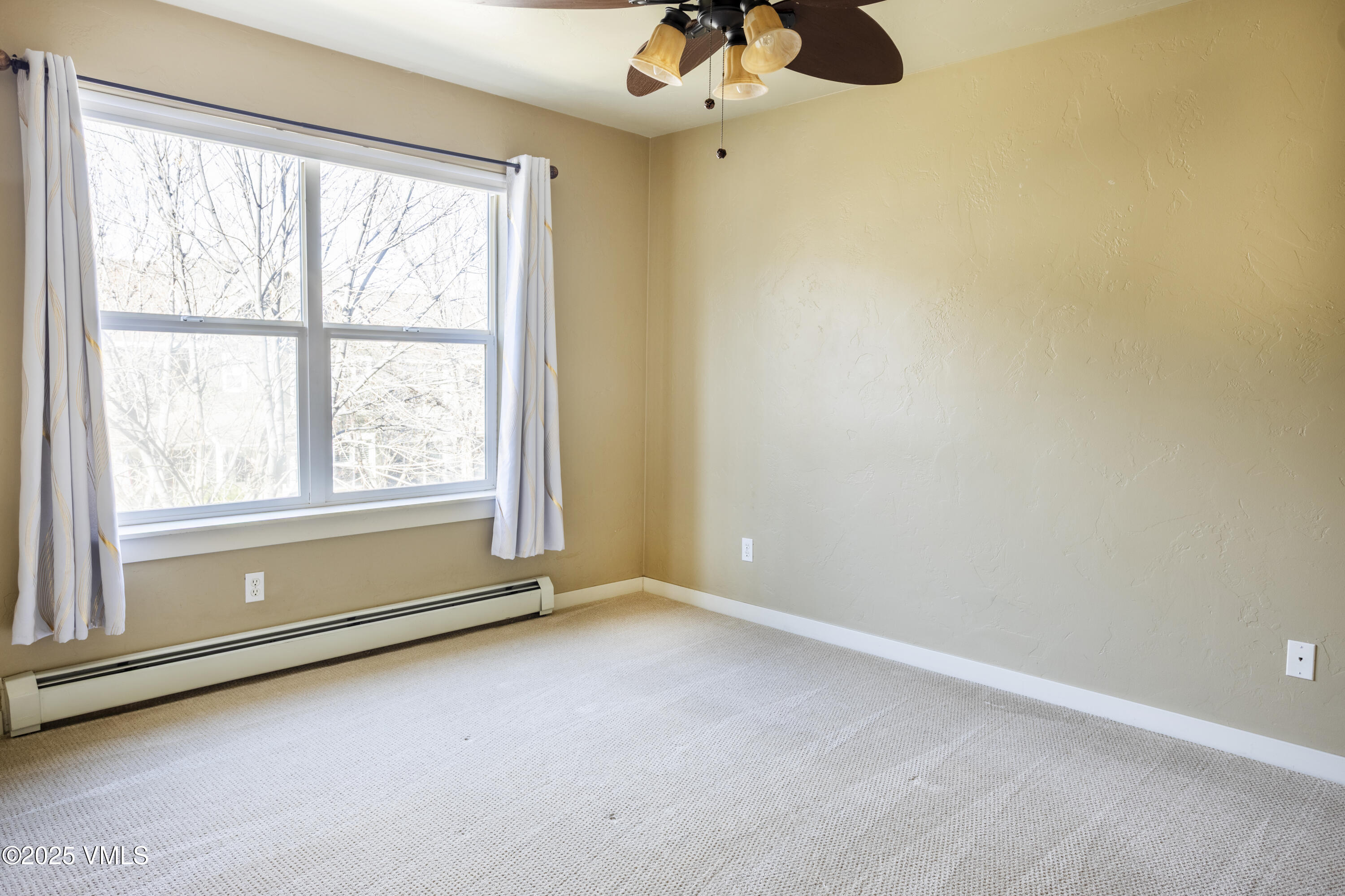 20 MacDonald Street Eagle, CO 81631 - Photo 4 of 10 an empty room with a window