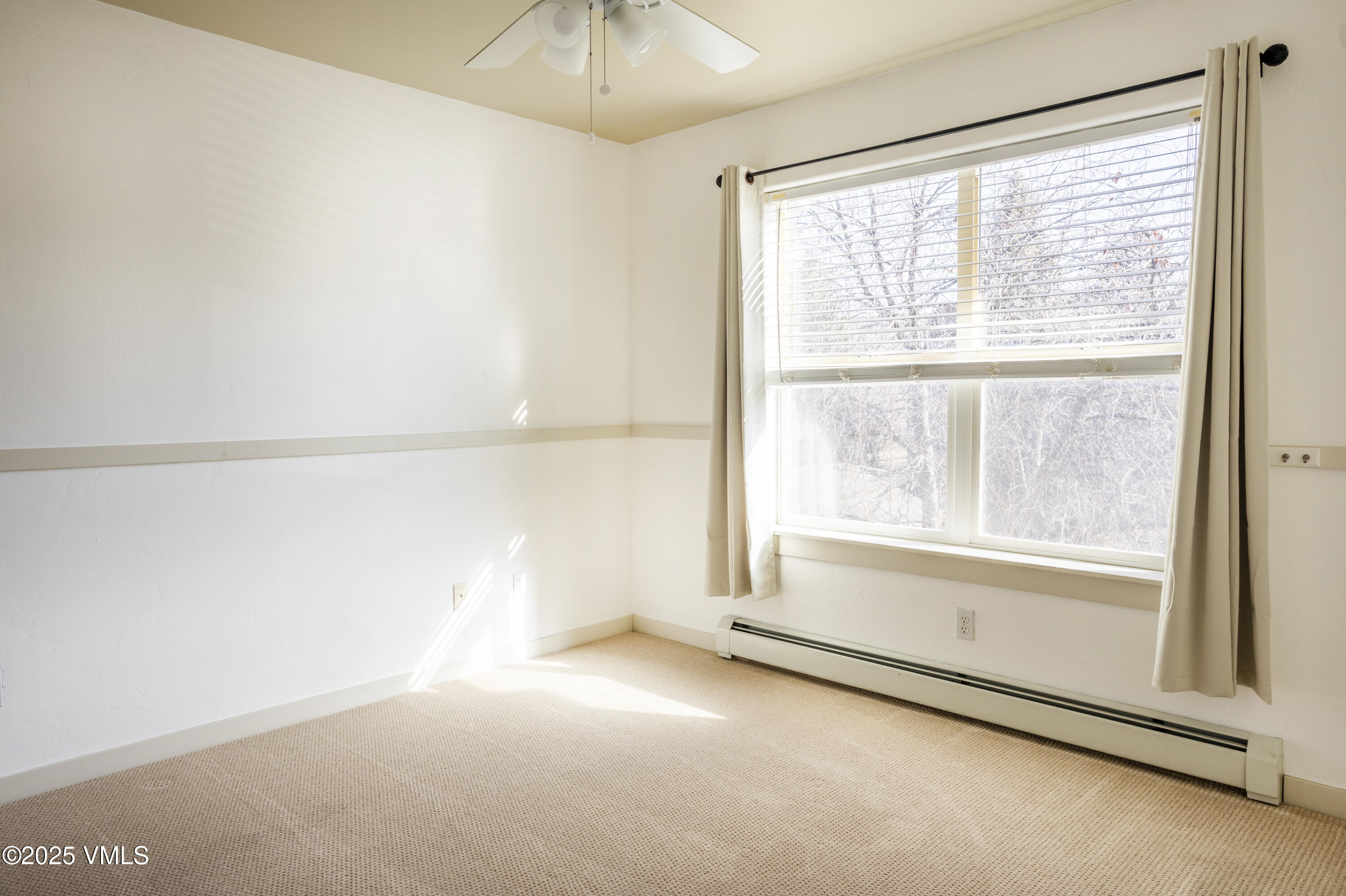20 MacDonald Street Eagle, CO 81631 - Photo 6 of 10 a view of an empty room with a window