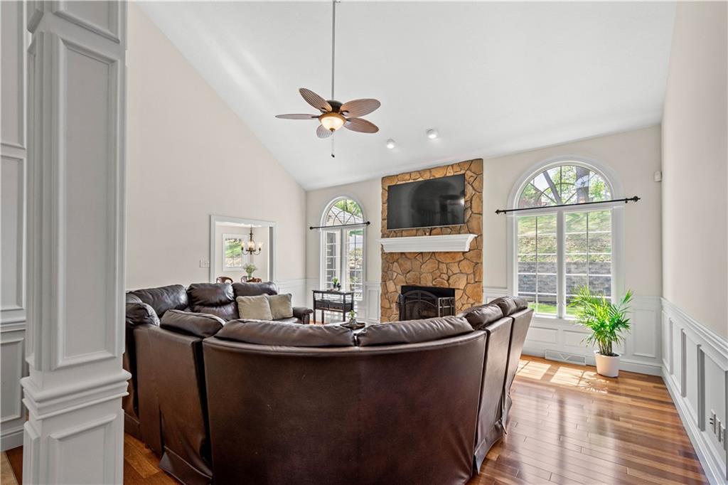 352 Water Works Road Sewickley, PA 15143 - Photo 11 of 49 a living room with furniture a fireplace and a potted plant