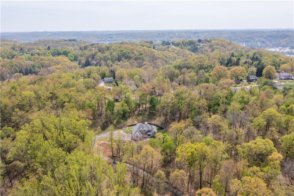 352 Water Works Road Sewickley, PA 15143 - Photo 3 of 49 an aerial view of houses with trees in the background