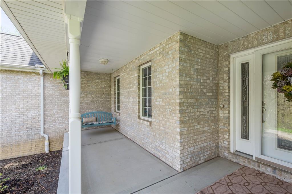 352 Water Works Road Sewickley, PA 15143 - Photo 5 of 49 a view of a porch with a table and chairs