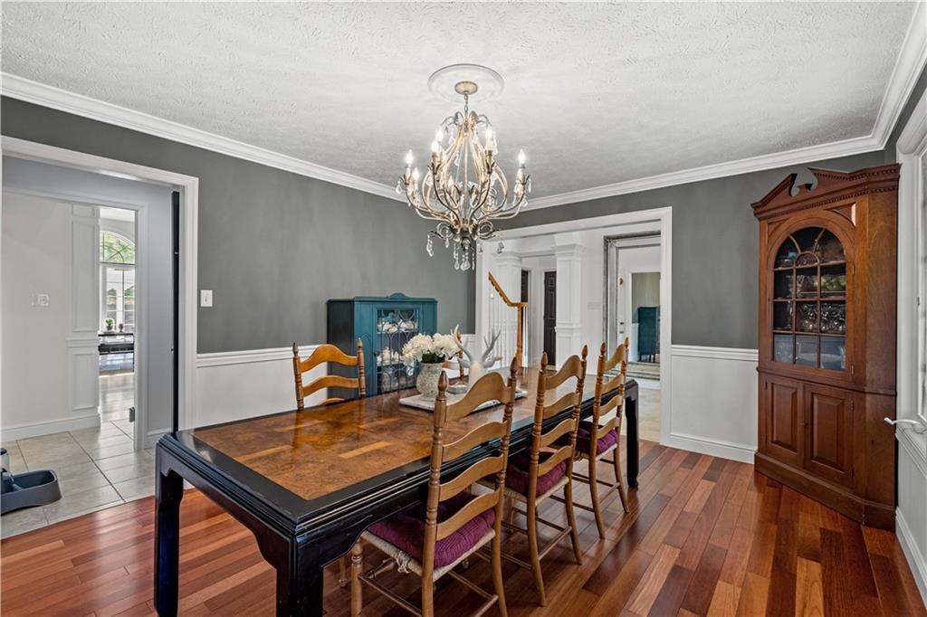 352 Water Works Road Sewickley, PA 15143 - Photo 8 of 49 a view of a dining room with furniture and wooden floor