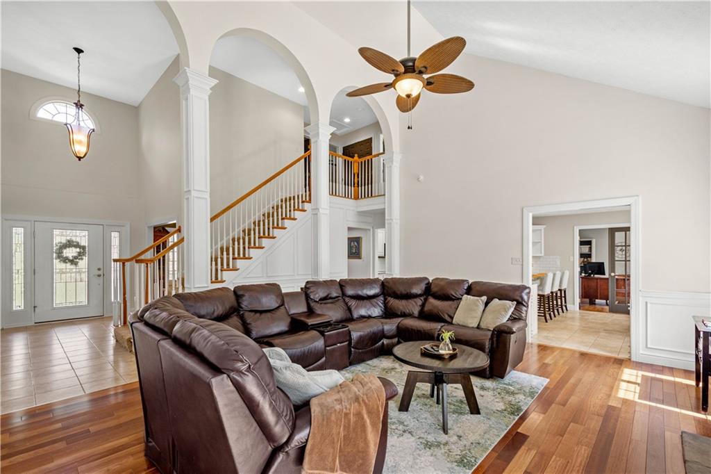 352 Water Works Road Sewickley, PA 15143 - Photo 9 of 49 a living room with furniture a dining table and wooden floor
