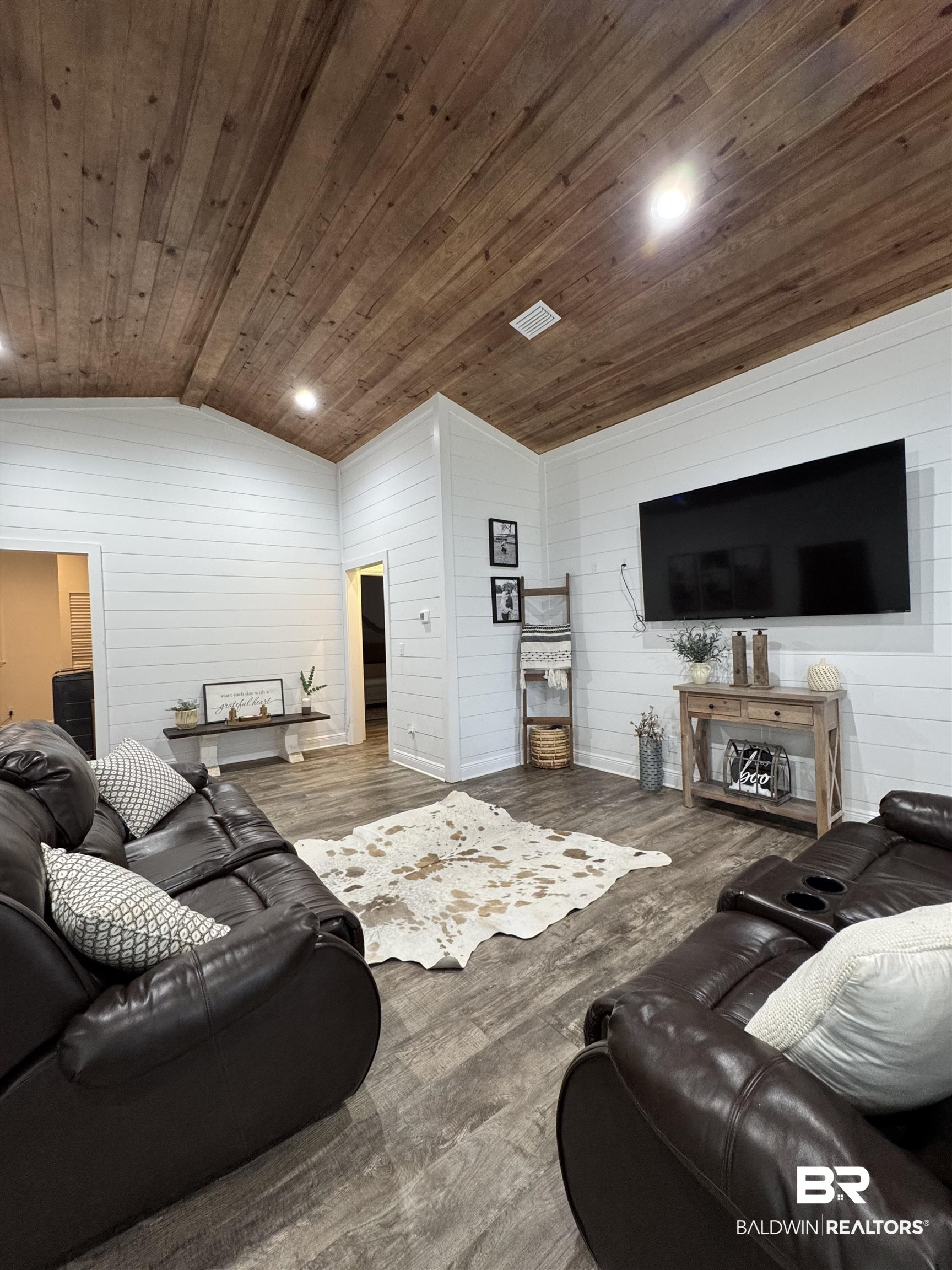 370 Dianne Road Frisco City, AL 36445 - Photo 24 of 41 Living room featuring wooden ceiling, wood-type flooring, and lofted ceiling