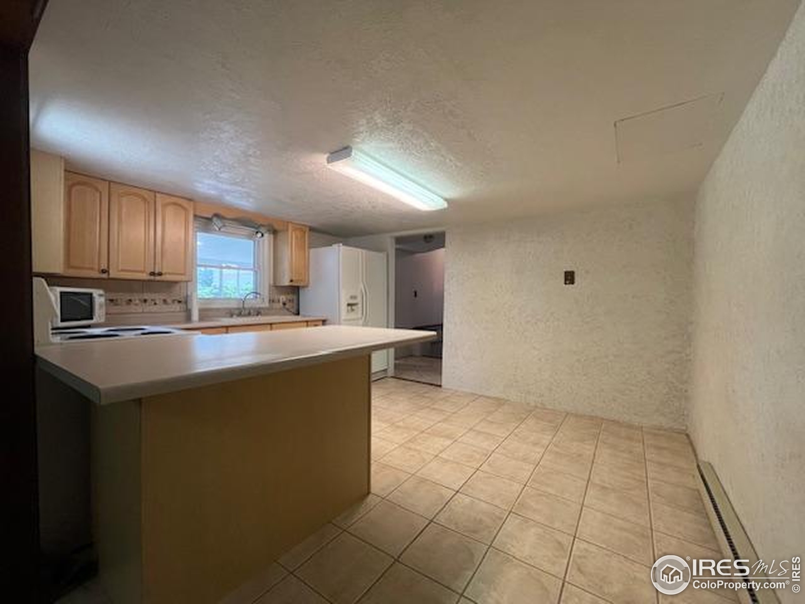 209 Chapman Street Wiggins, CO 80654 - Photo 11 of 36