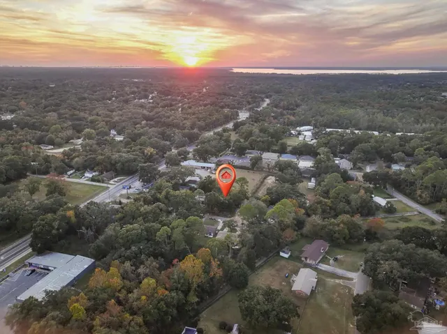a view of city and green space