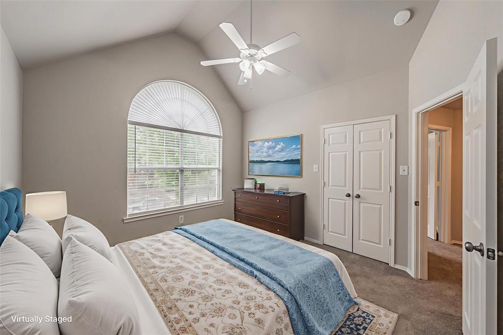 1803 Haydenbend Circle Grapevine, TX 76051 - Photo 30 of 40 Virtually Staged Bedroom on the front of the house with vaulted ceiling and ceiling fan.