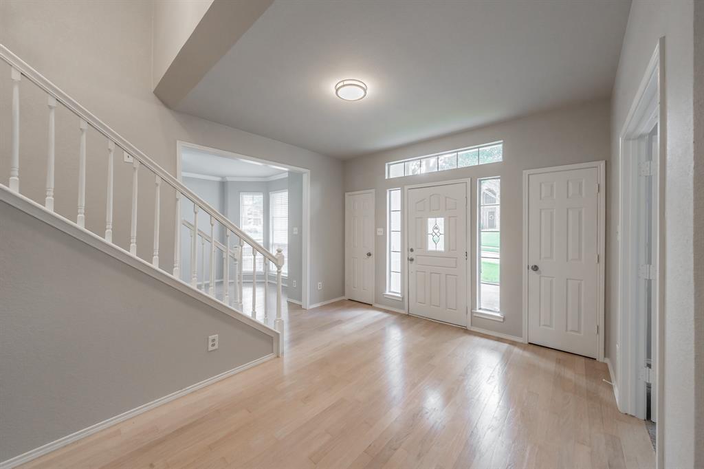 1803 Haydenbend Circle Grapevine, TX 76051 - Photo 3 of 40 Large entryway with coat closets and space for sitting area or even a Christmas tree!