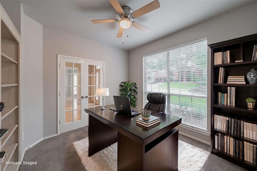1803 Haydenbend Circle Grapevine, TX 76051 - Photo 5 of 40 Office featuring french doors, built in shelves, and ceiling fan for added comfort.