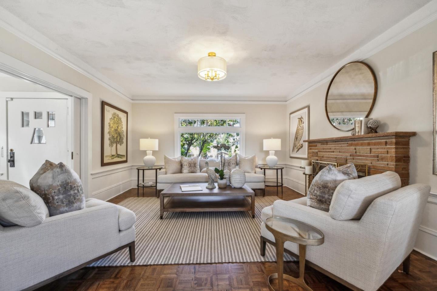 829 Edgehill Drive Burlingame, CA 94010 - Photo 12 of 99 a living room with furniture a fireplace and a potted plant