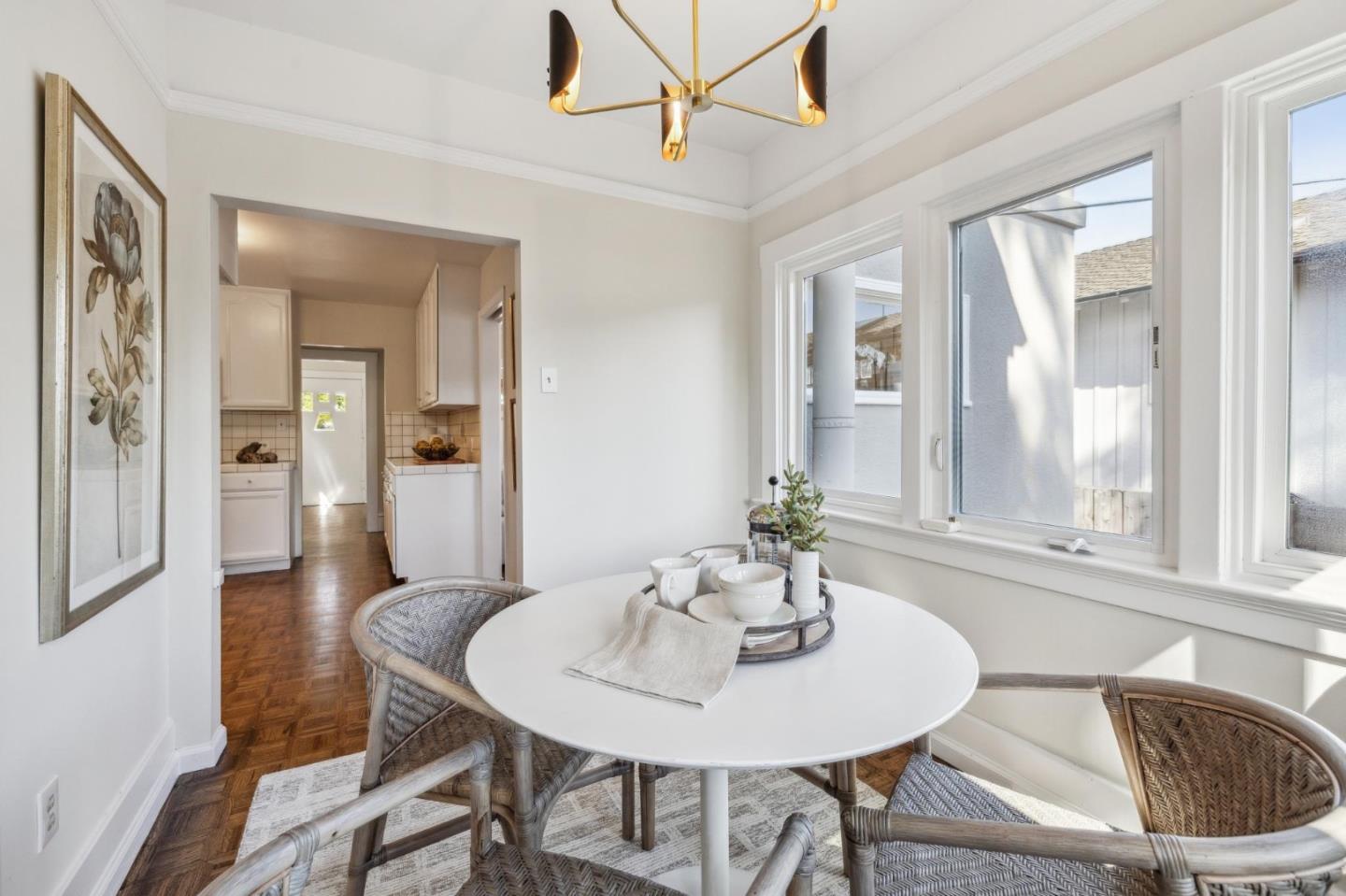 829 Edgehill Drive Burlingame, CA 94010 - Photo 27 of 99 a view of a dining room with furniture and wooden floor