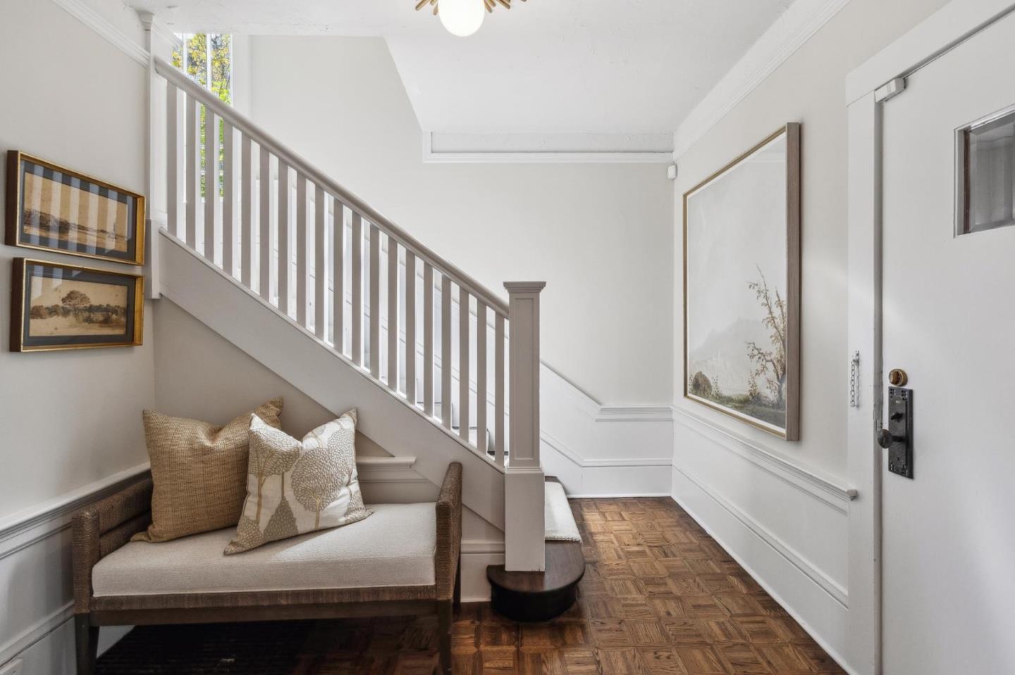 829 Edgehill Drive Burlingame, CA 94010 - Photo 35 of 99 a living room with furniture and a wooden floor
