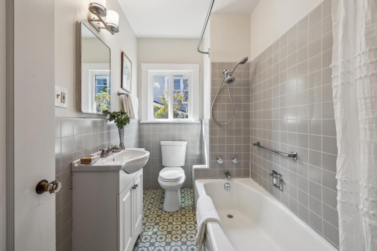 829 Edgehill Drive Burlingame, CA 94010 - Photo 49 of 99 a bathroom with a sink a toilet and shower