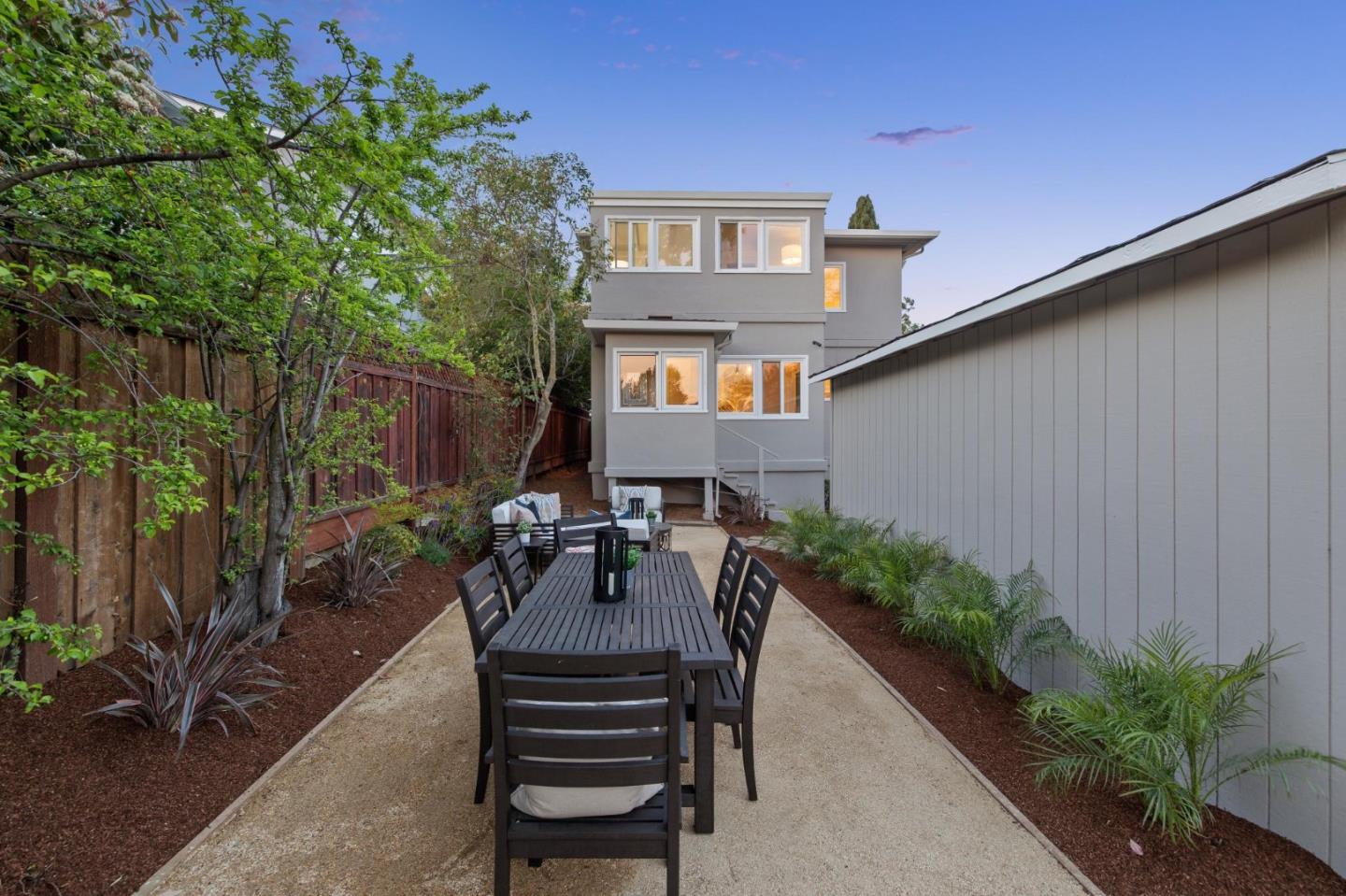 829 Edgehill Drive Burlingame, CA 94010 - Photo 85 of 99 a view of a patio with table and chairs and potted plants