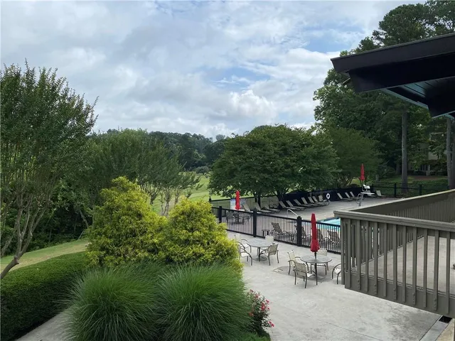 a view of a terrace with sitting area