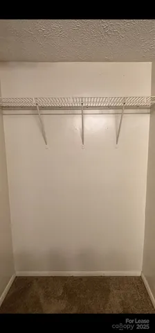 a view of small space with racks on the wall