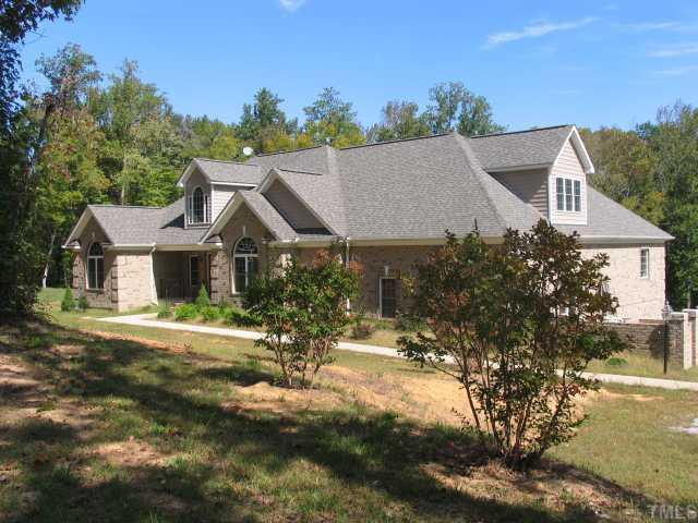 30 Piney Grove Road Bahama, NC 27503 - Photo 1 of 12 Beautiful brick equestrian estate on ~8 acres near Lake Michie about 25 minutes from Duke U. Exceptional quality throughout and less than 5 years old. Exterior Front