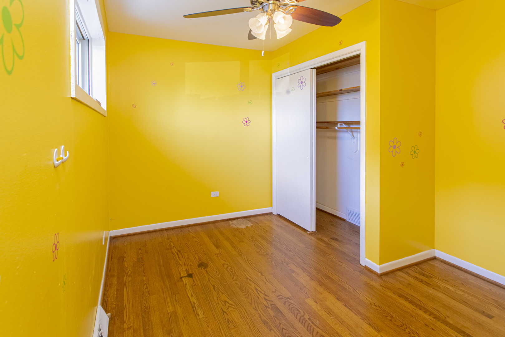 11040 Massasoit Avenue Chicago Ridge, IL 60415 - Photo 5 of 23 a view of an empty room with a window