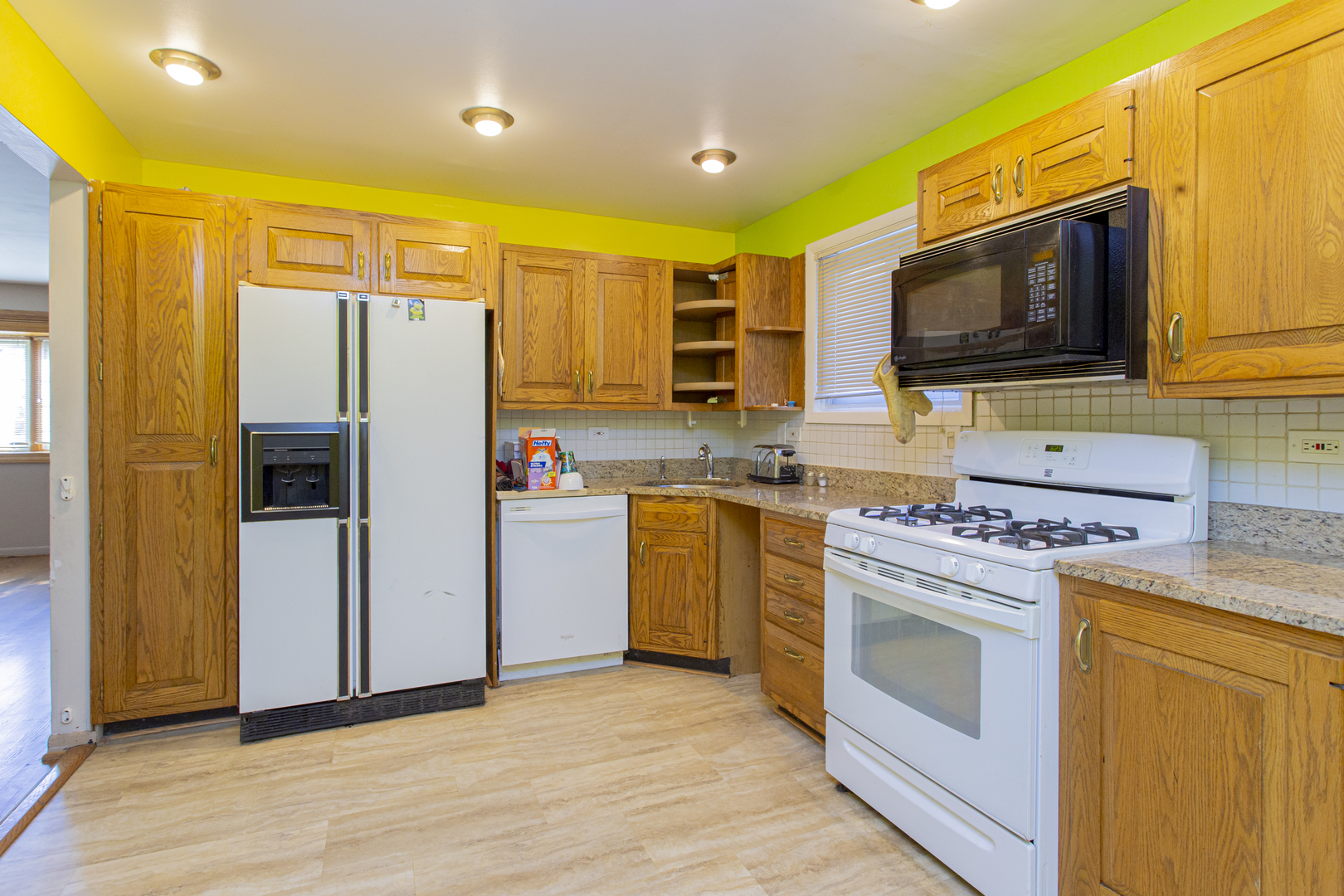 11040 Massasoit Avenue Chicago Ridge, IL 60415 - Photo 8 of 23 a kitchen with a sink stove and refrigerator