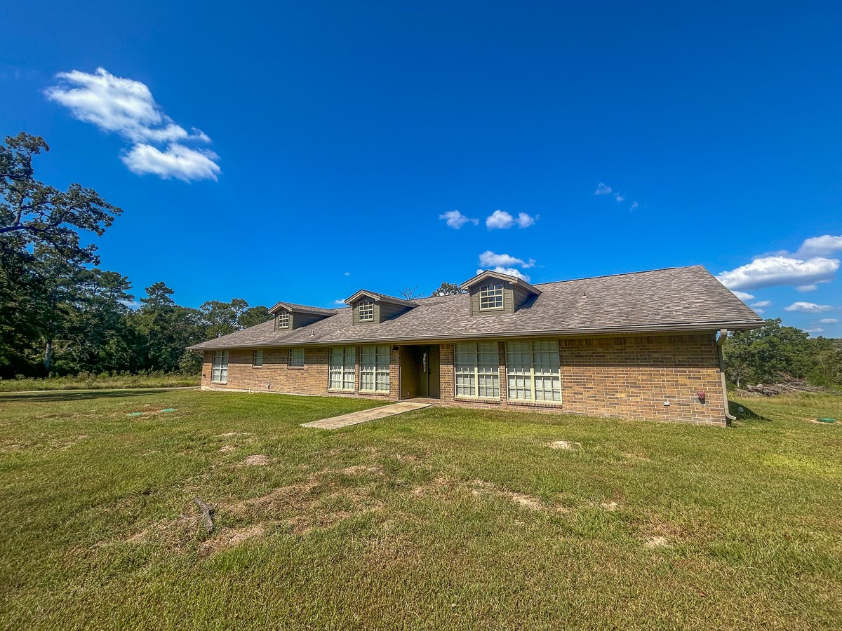 50 Neiderhoffer Subdivision Road Huntsville, TX 77340 - Photo 1 of 20 a view of a house with a big yard