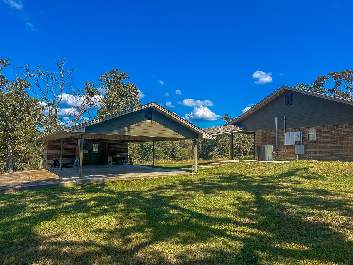 50 Neiderhoffer Subdivision Road Huntsville, TX 77340 - Photo 2 of 20 a view of a house with a yard