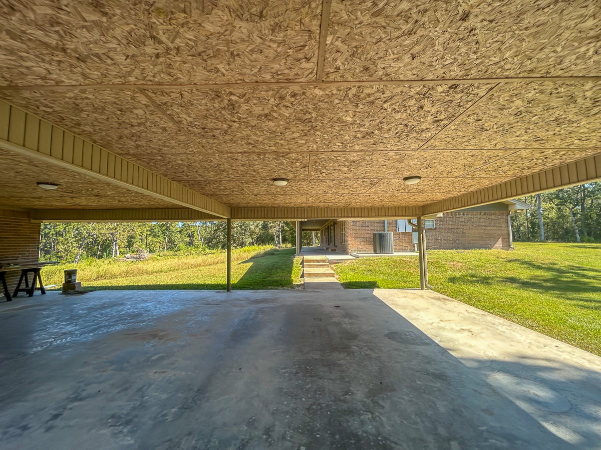 50 Neiderhoffer Subdivision Road Huntsville, TX 77340 - Photo 3 of 20 a view of a swimming pool with an outdoor seating