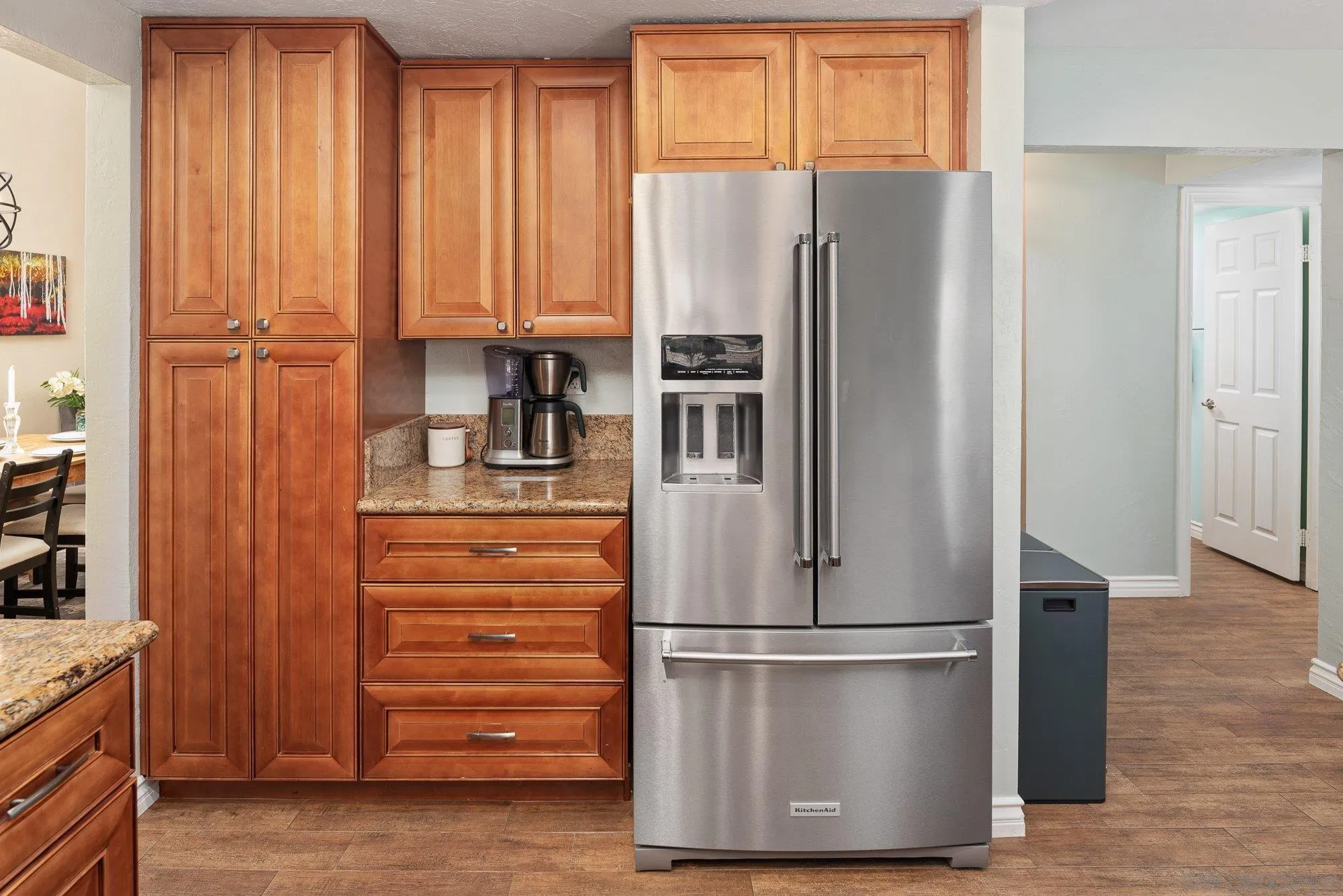 10246 Princess Joann Road Santee, CA 92071 - Photo 15 of 48 a metallic refrigerator freezer sitting in a kitchen
