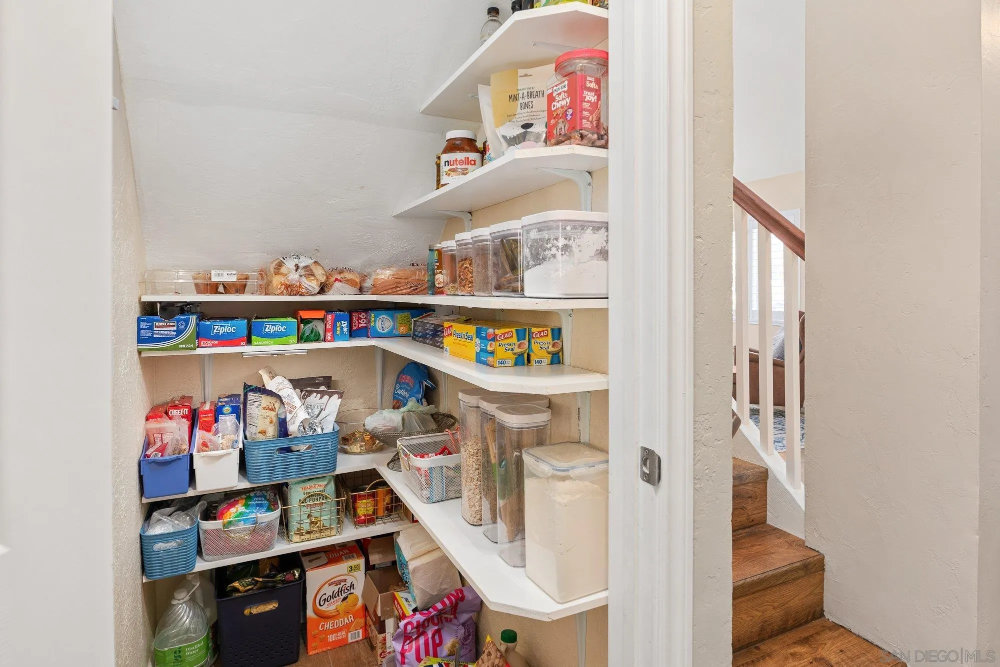 10246 Princess Joann Road Santee, CA 92071 - Photo 16 of 48 a utility room with lots of baby toys
