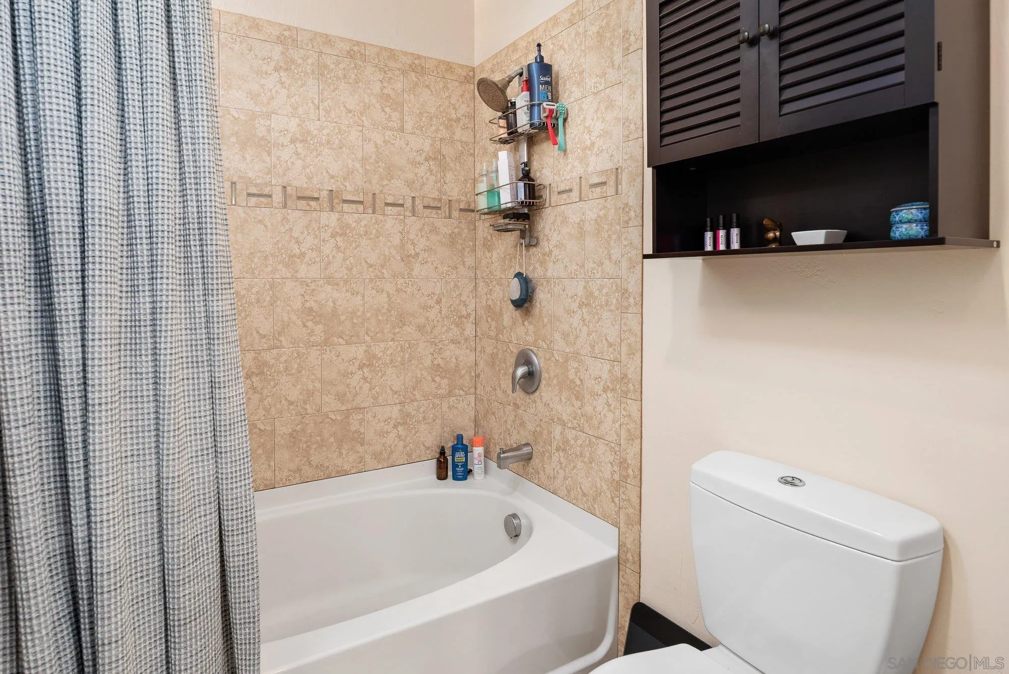 10246 Princess Joann Road Santee, CA 92071 - Photo 26 of 48 a bathroom with a bathtub and a shower