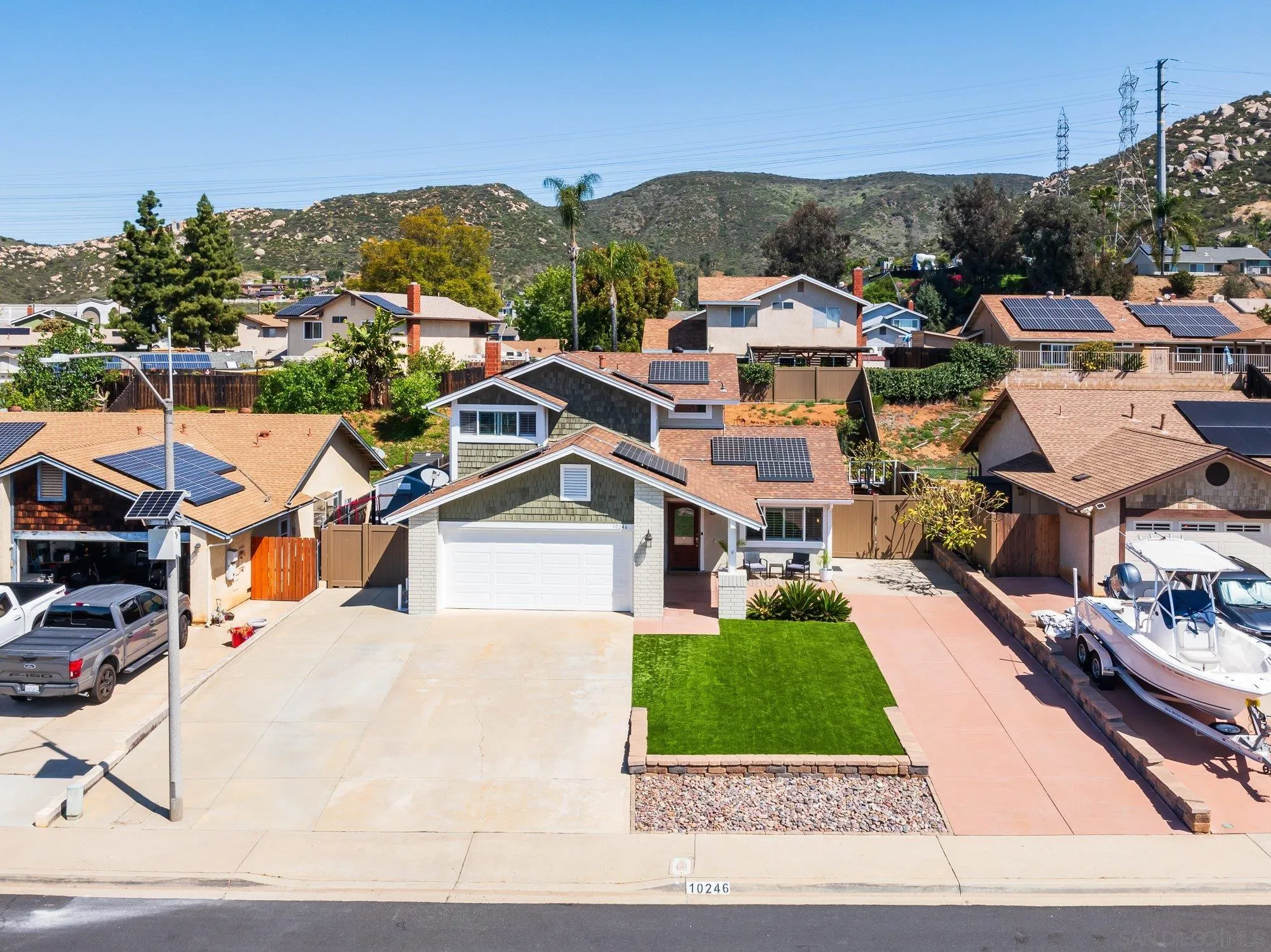 10246 Princess Joann Road Santee, CA 92071 - Photo 4 of 48 a view of multiple houses with yard