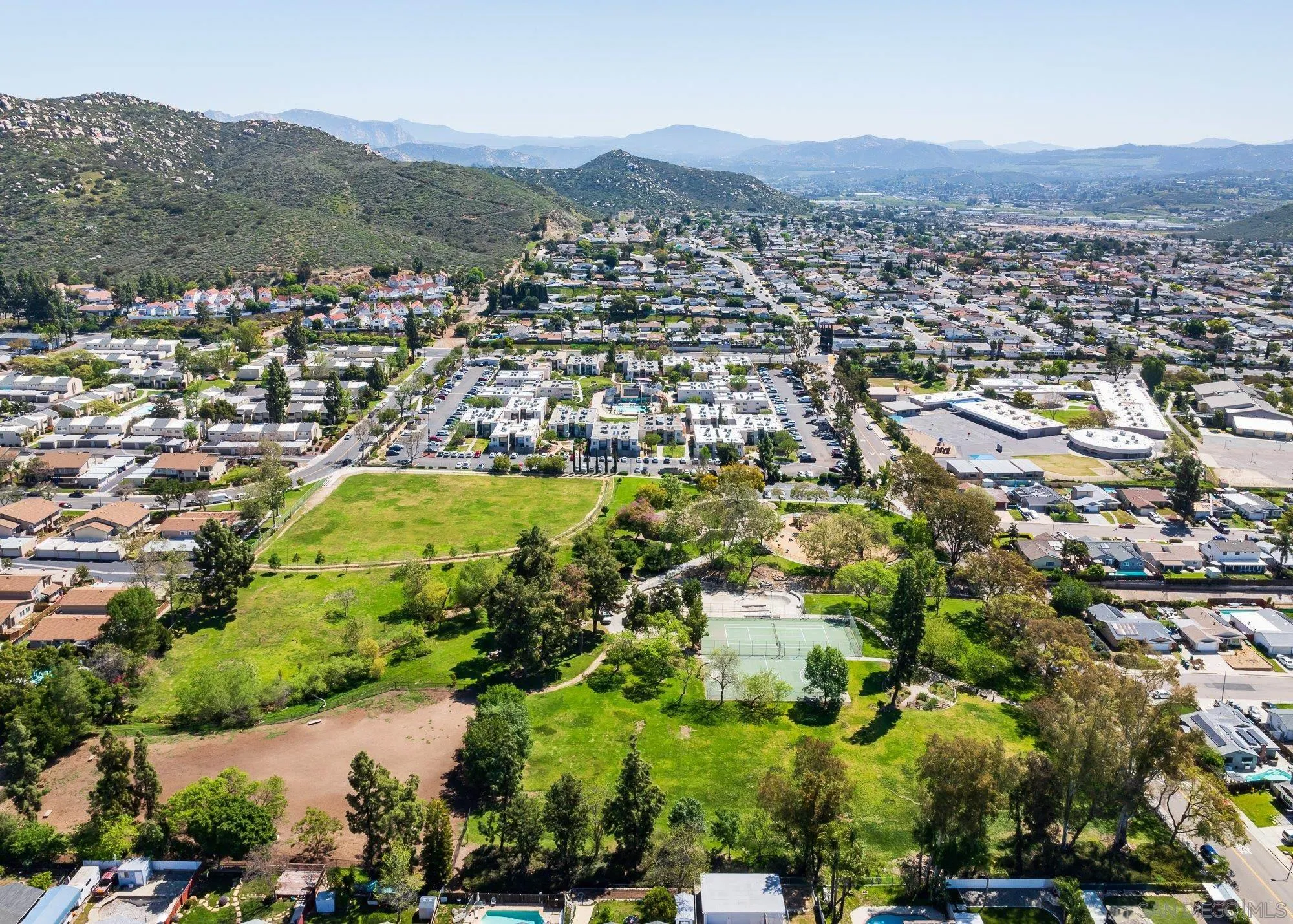 10246 Princess Joann Road Santee, CA 92071 - Photo 45 of 48 an aerial view of residential houses with outdoor space and trees