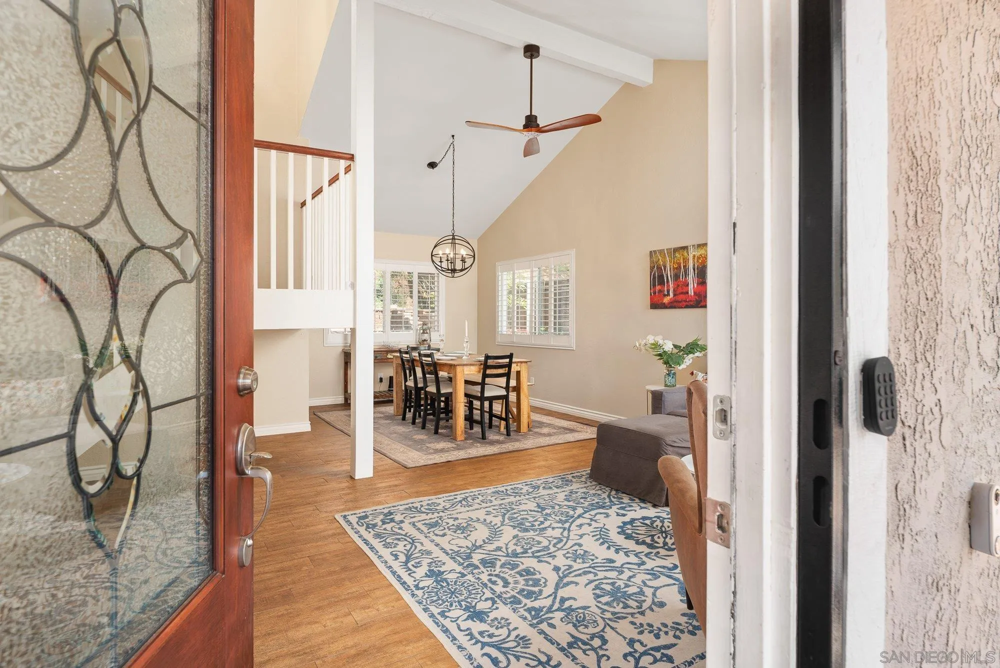 10246 Princess Joann Road Santee, CA 92071 - Photo 7 of 48 a living room with furniture and a rug
