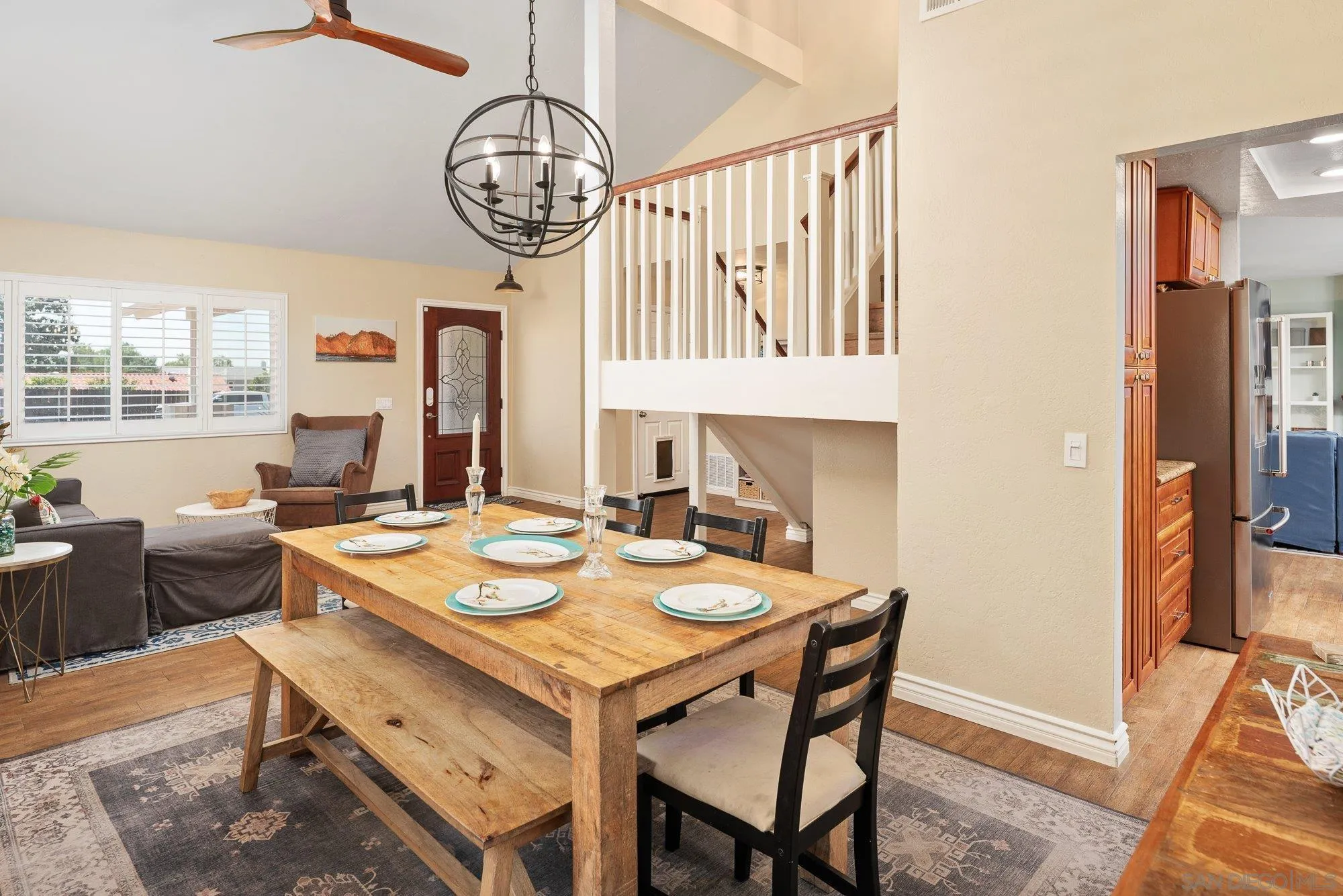 10246 Princess Joann Road Santee, CA 92071 - Photo 10 of 48 a view of a dining room with furniture window and wooden floor