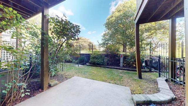 a view of backyard with green space