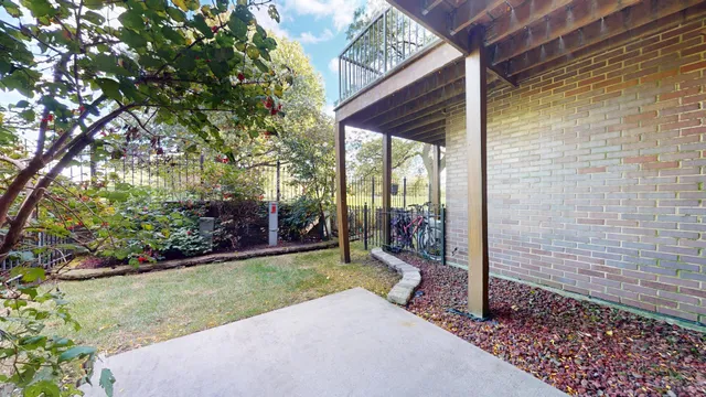 a view of a backyard with garden