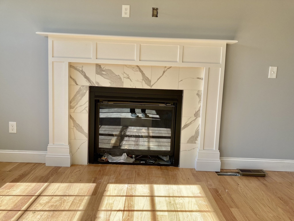 30 Emerald Road Rutland, MA 01543 - Photo 8 of 36 a living room with a fireplace