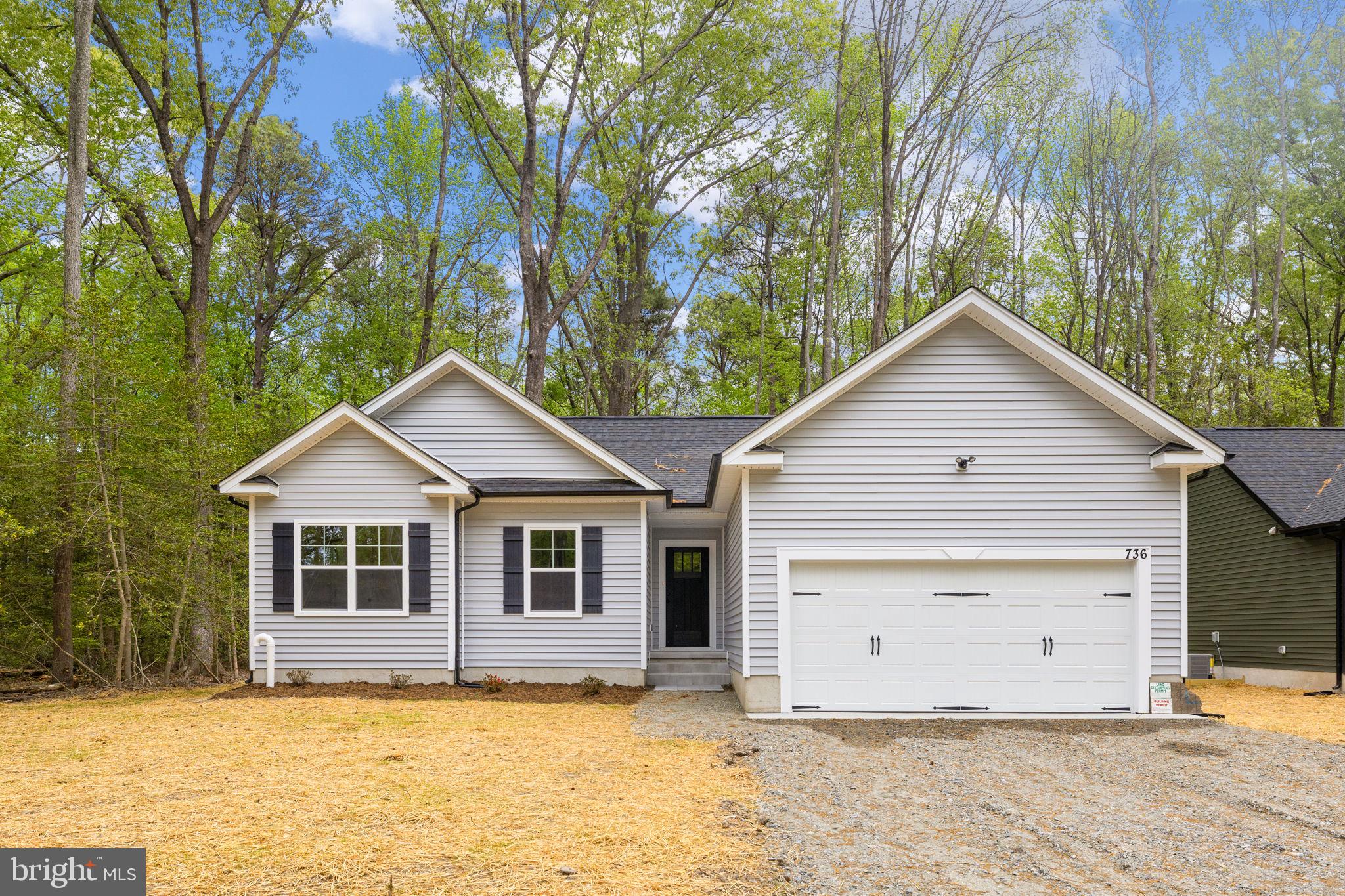 736 Circle Lane Colonial Beach, VA 22443 - Photo 1 of 40 a view of a house with a yard